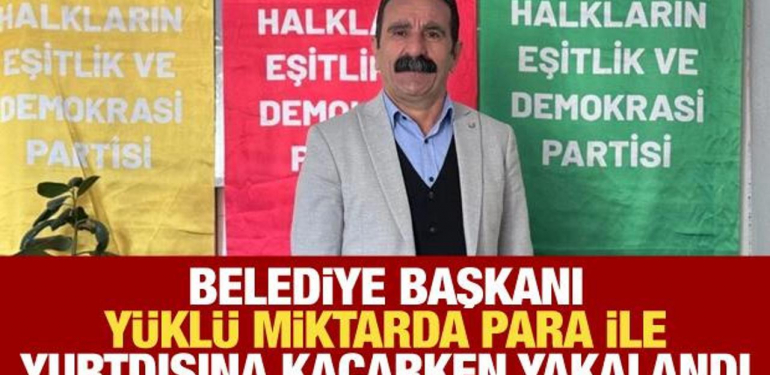 Belediye başkanı yurt dışına kaçarken yüklü miktarda para ile yakalandı!